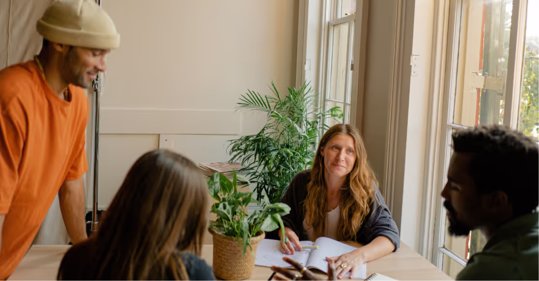 A group of coworkers at an in-person gathering